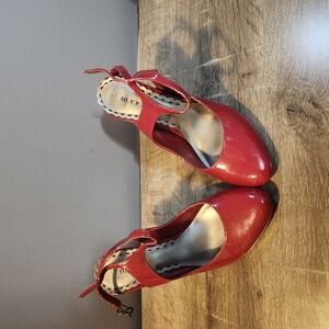 Vibrant Red Stiletto Heels with Peep-Toe Design